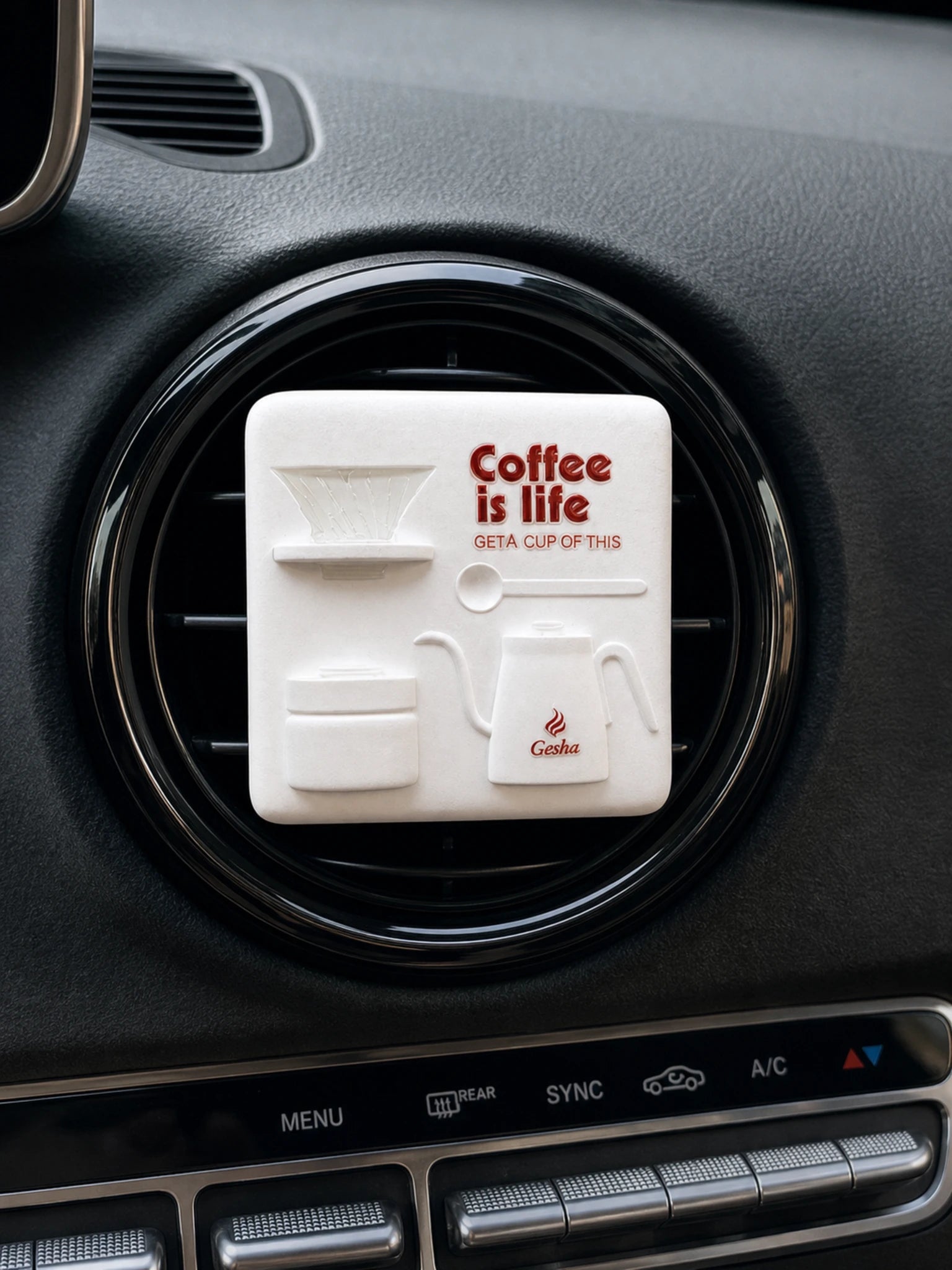 Square Coffee Ritual piece with raised coffee-tool relief and physical lettering