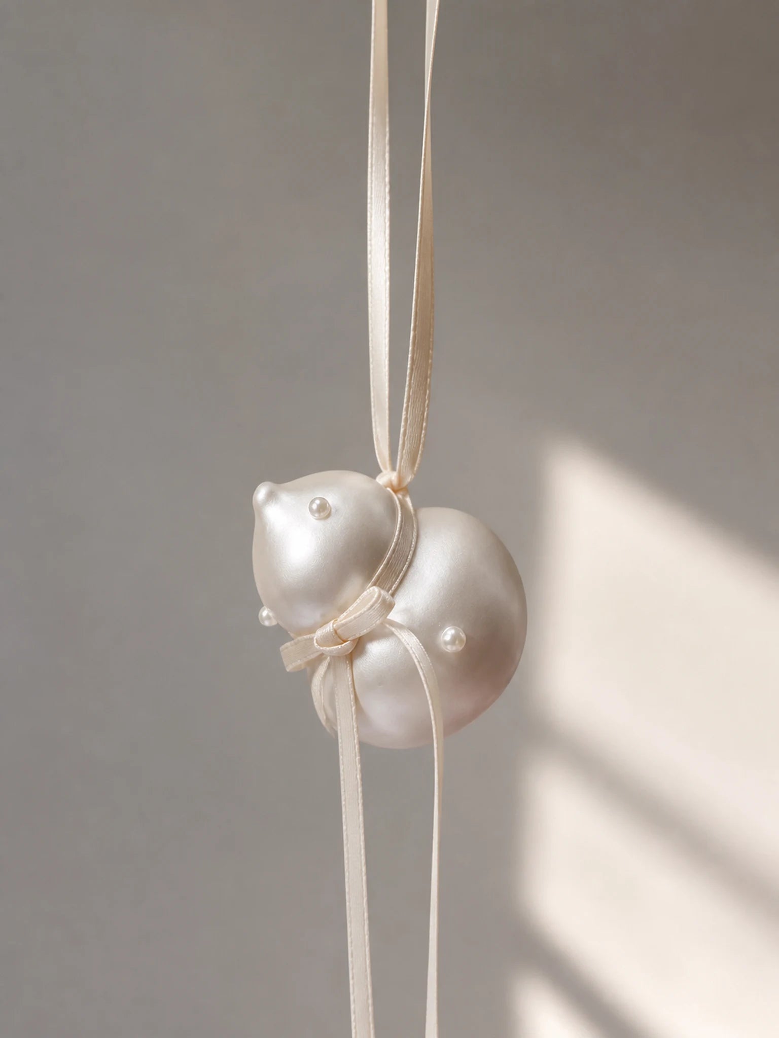 Pearl Gourd Hanging Car Charm on a clean studio background