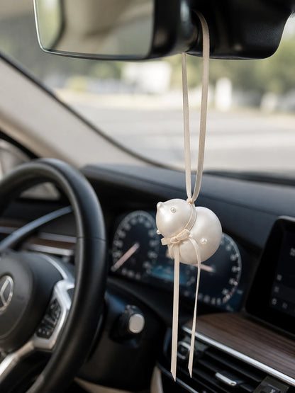 Pearl Gourd Hanging Car Charm suspended from a Mercedes-Benz rearview mirror