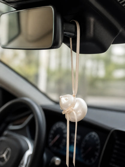 Pearl Gourd charm champagne ribbon and hanging attachment detail