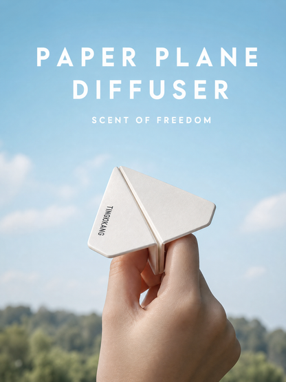 Paper plane air freshener against blue sky background