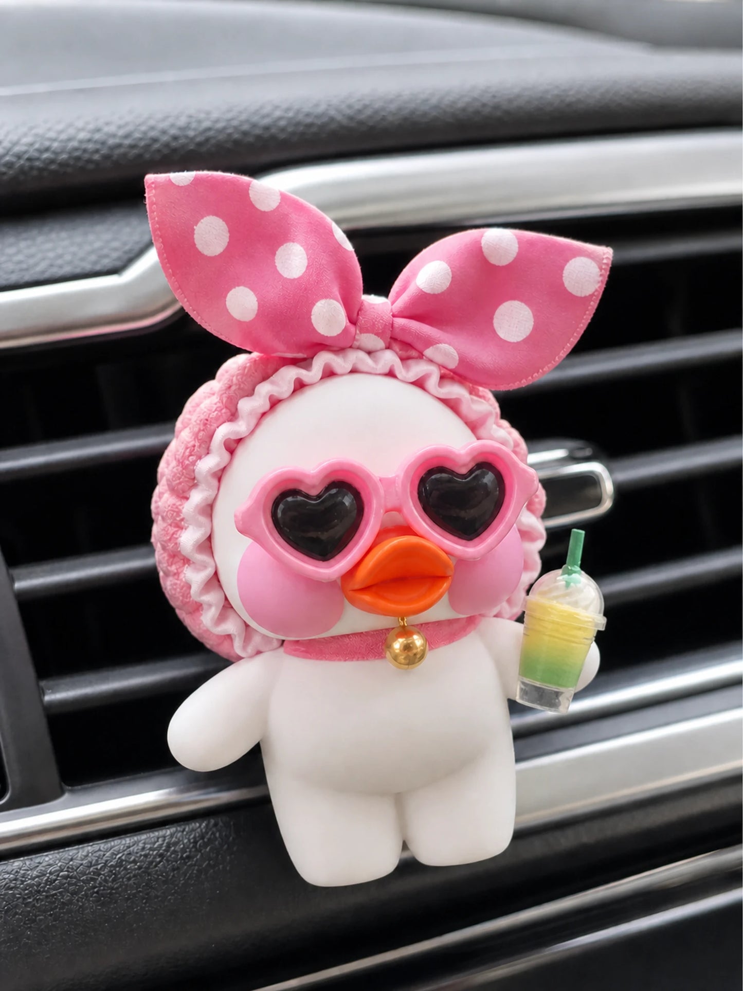 Blush Duck bow, face, drink accessory, and vent placement detail