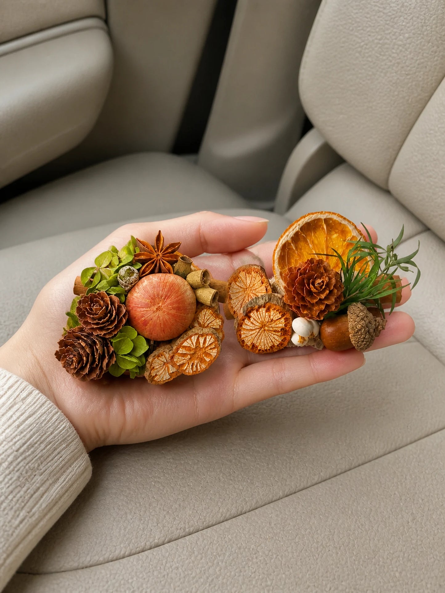 Botanical Citrus car vent garden styles shown at hand scale