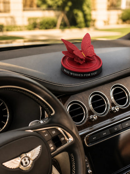Burgundy Butterfly Dashboard Ornament displayed in a Bentley interior