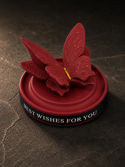 Burgundy Butterfly ornament base and ribbon detail