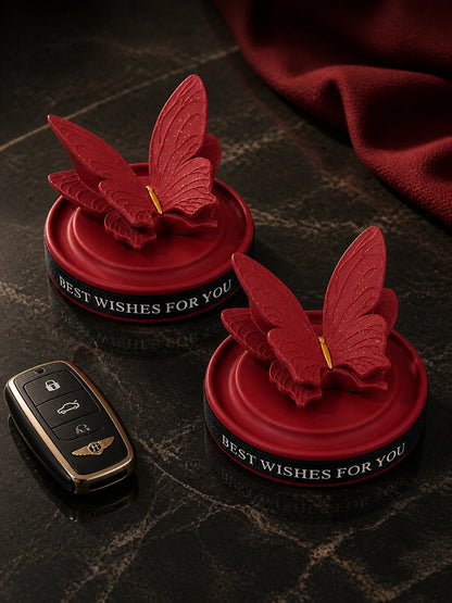 Two Burgundy Butterfly Dashboard Ornaments styled as an optional pair