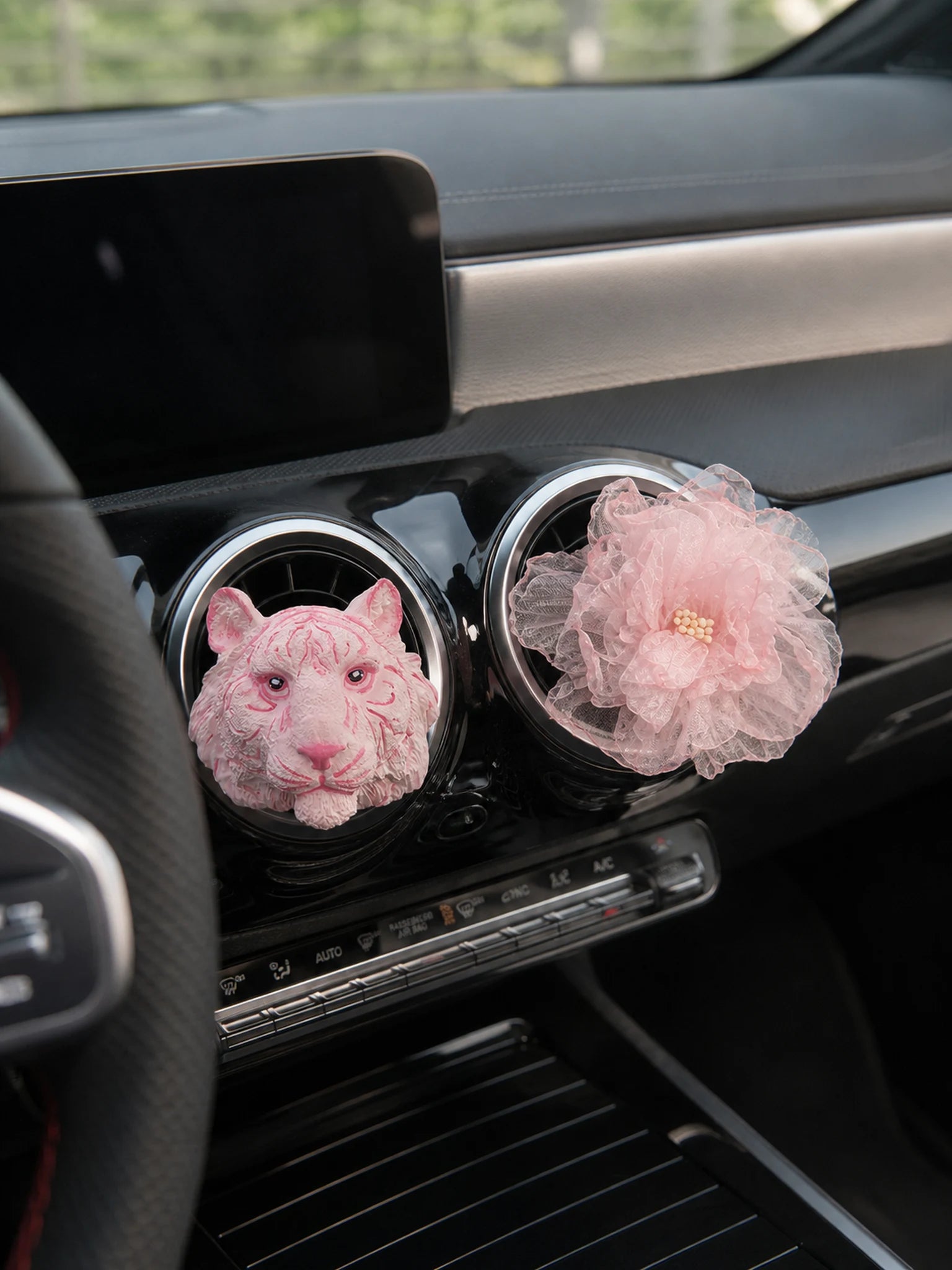 Blush Tiger and Rose styles installed on separate Mercedes-Benz vents