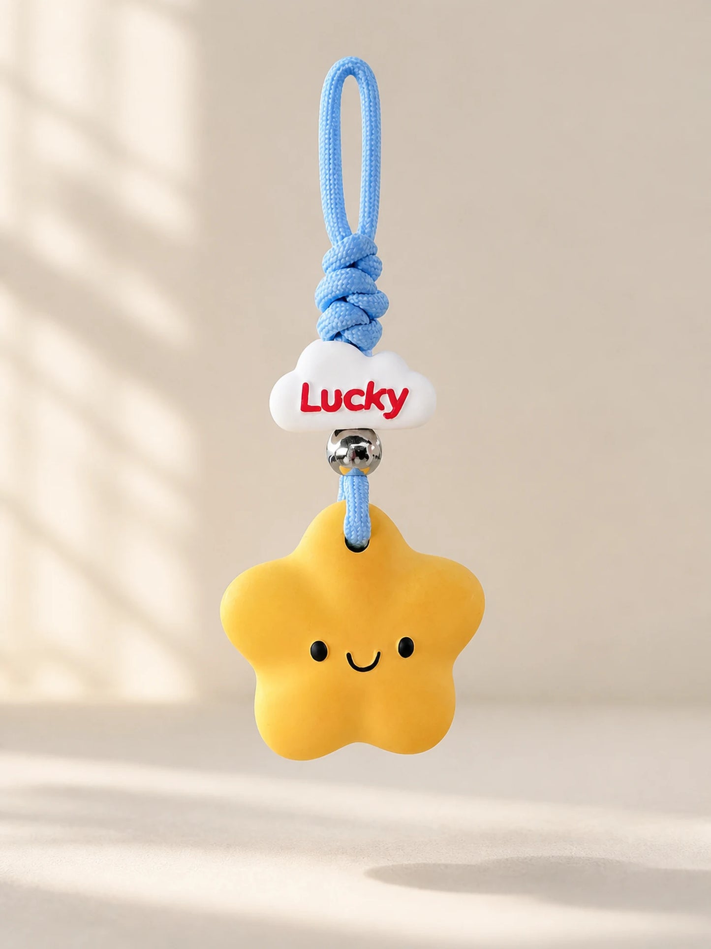 Lucky Star Hanging Car Charm on a clean neutral background