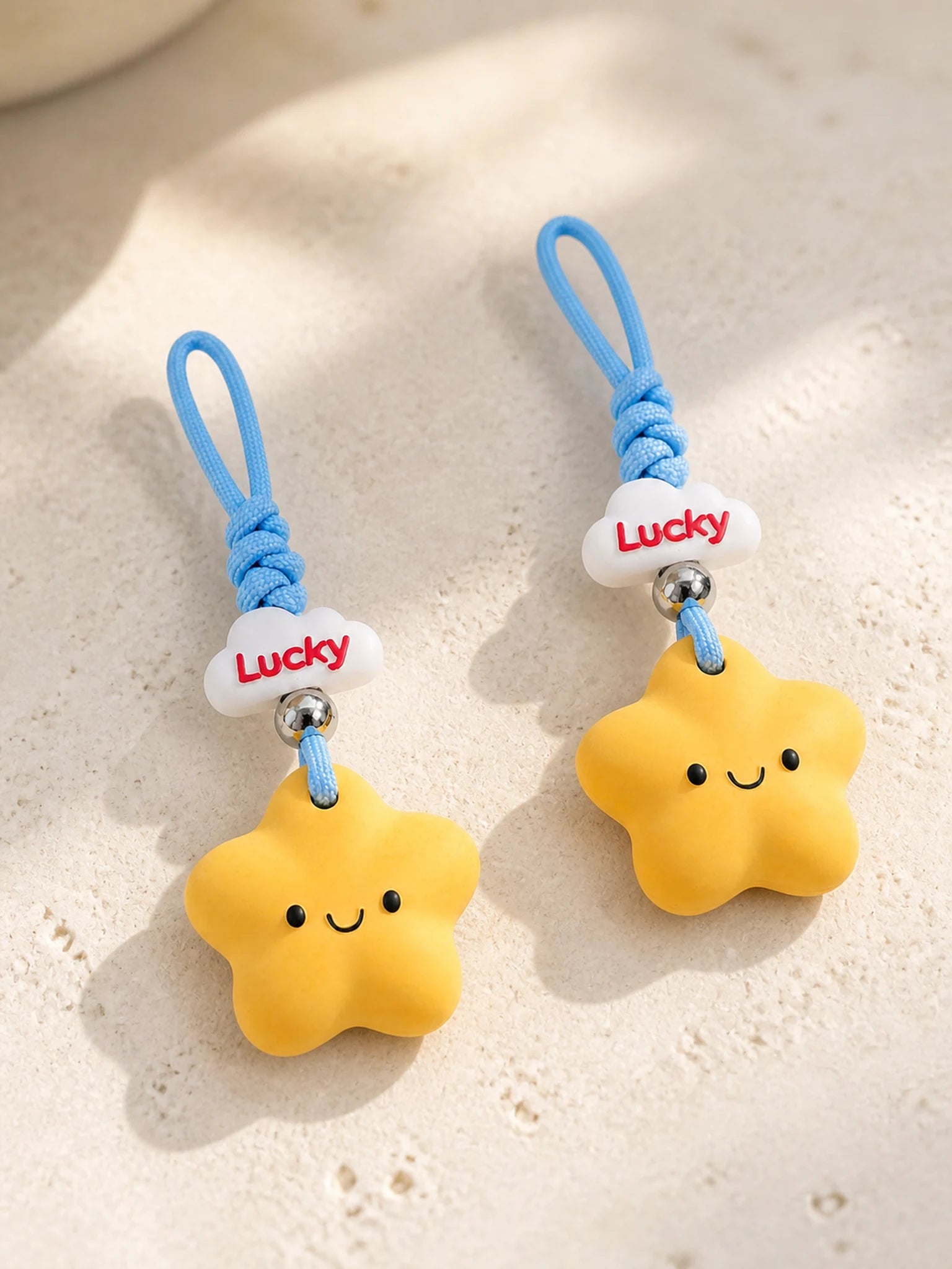 Two Lucky Star hanging charms styled together