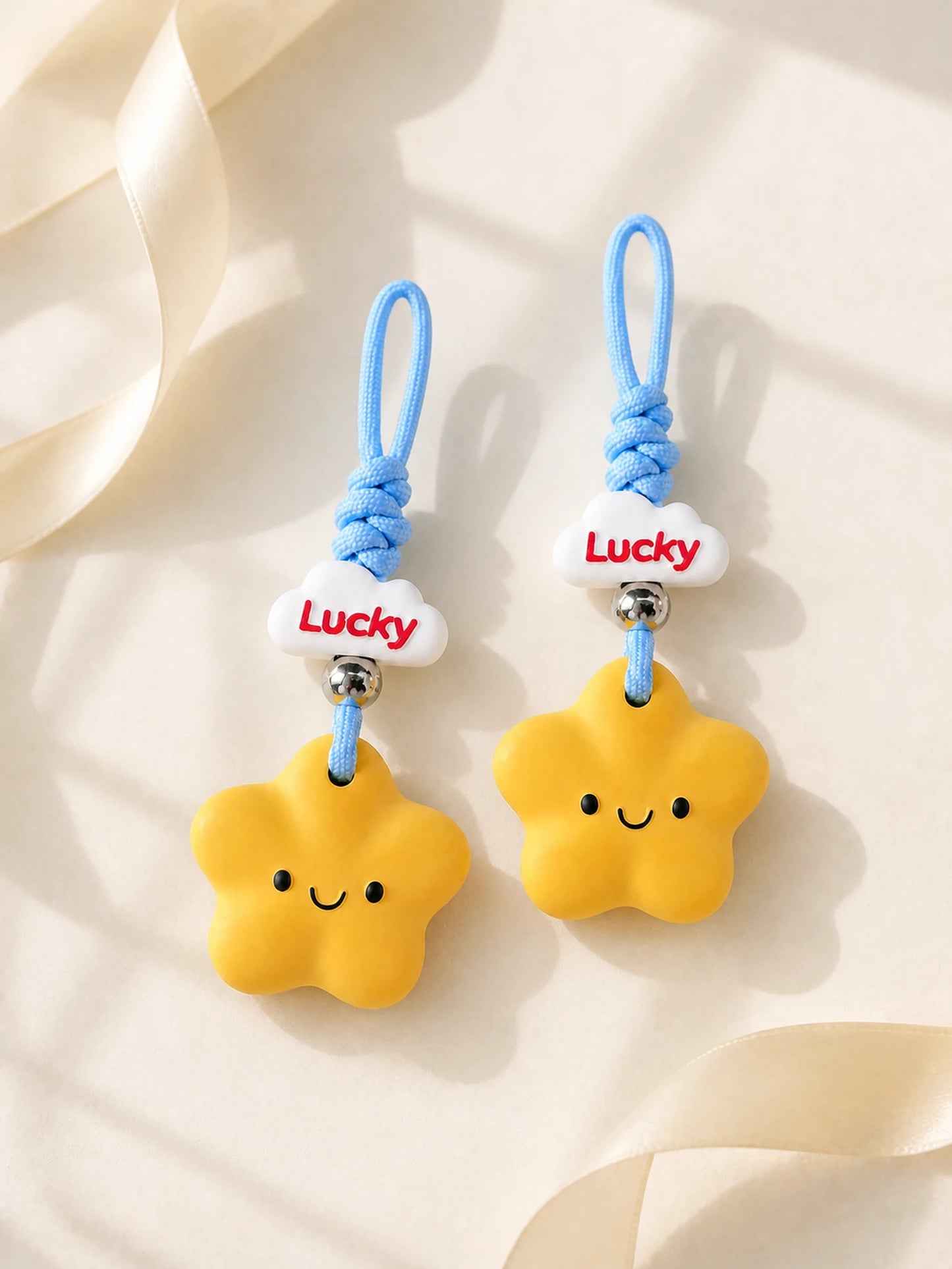 Two Lucky Star Hanging Car Charms styled as an optional pair