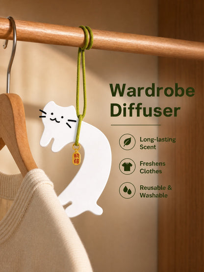 Gypsum cat diffuser hanging in closet with clothes