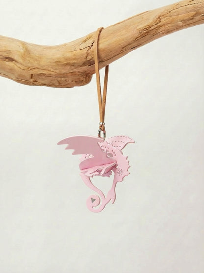 Hand-assembled dragon paper fragrance charm in black and warm tones