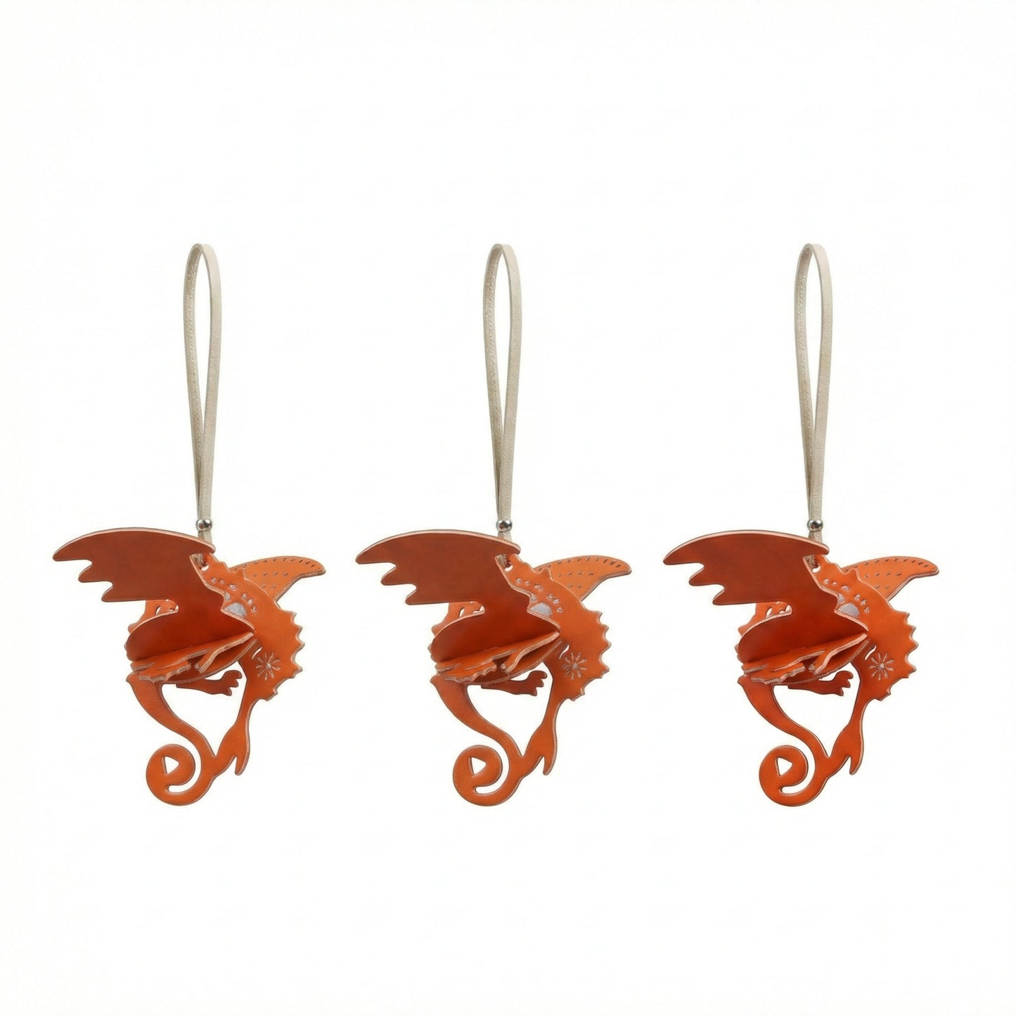 Hand-assembled dragon paper fragrance charm in black and warm tones