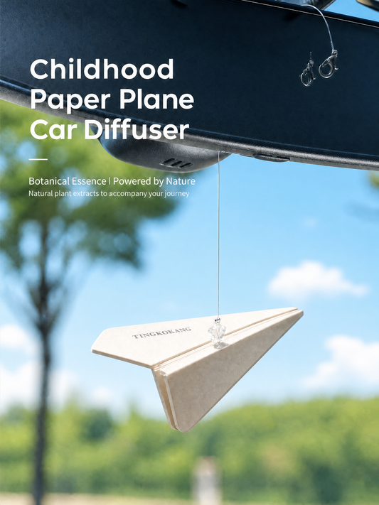 Paper plane air freshener against blue sky background