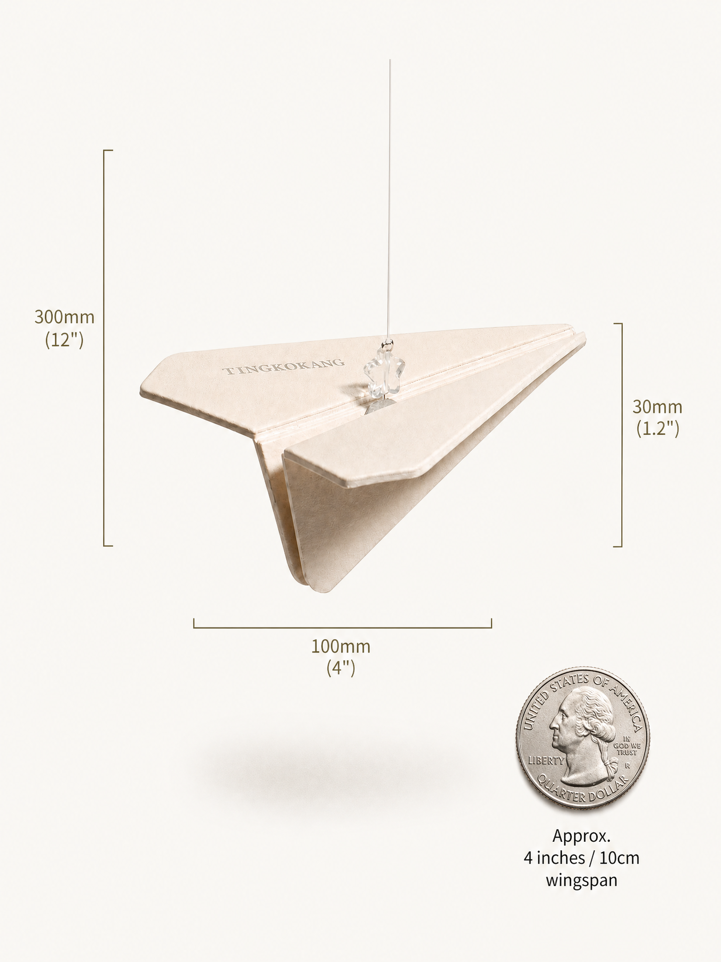 Paper plane diffuser size comparison with quarter coin