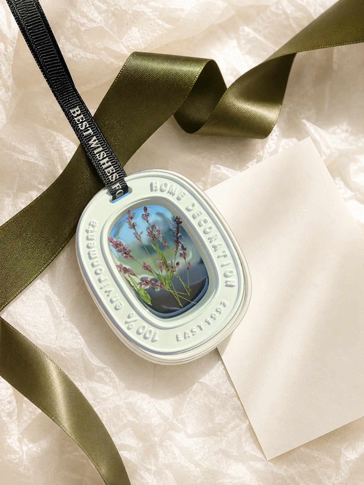 Heather Purple botanical window car charm presented with neutral tissue for gifting inspiration