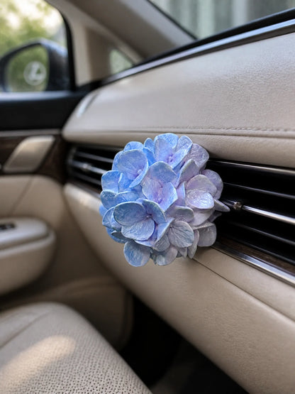 Blue Lilac Hydrangea Bloom installed squarely on a compatible horizontal car vent