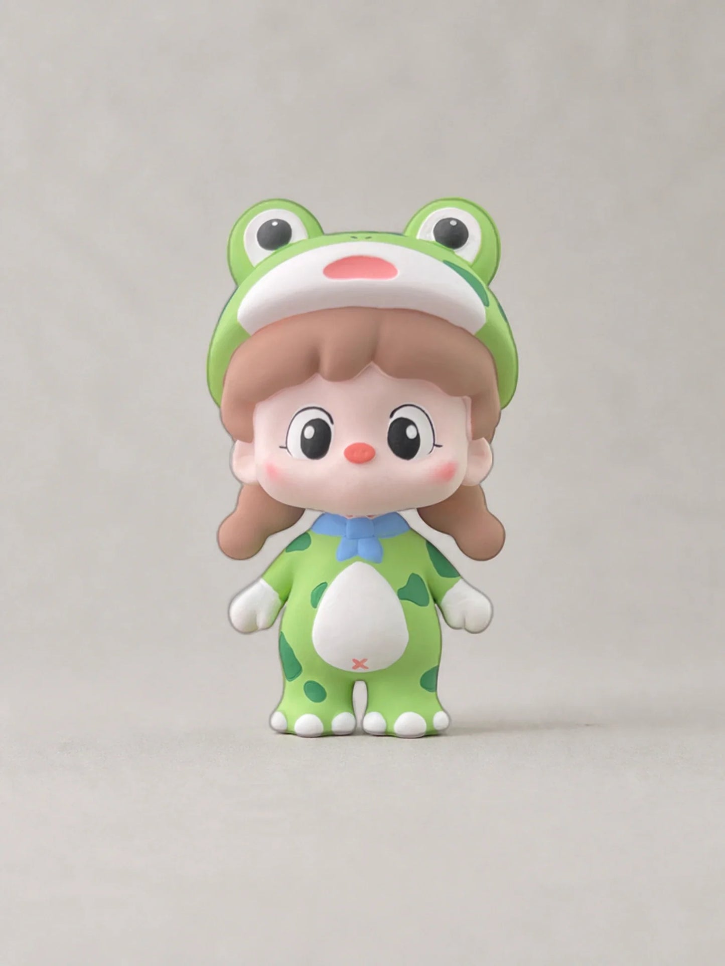 Green Frog Girl car vent ornament with original frog hood, blue bow and spotted suit