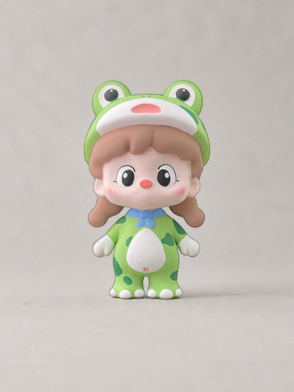 Green Frog Girl car vent ornament with original frog hood, blue bow and spotted suit