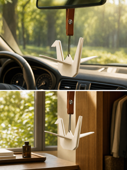 Origami crane air freshener hanging in wooden closet with clothes