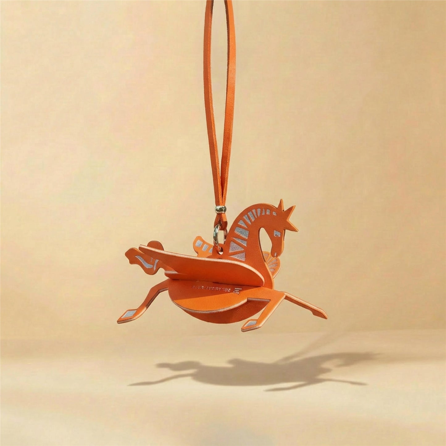 BBYM x SandartFlow horse refillable fragrance charm in warm orange