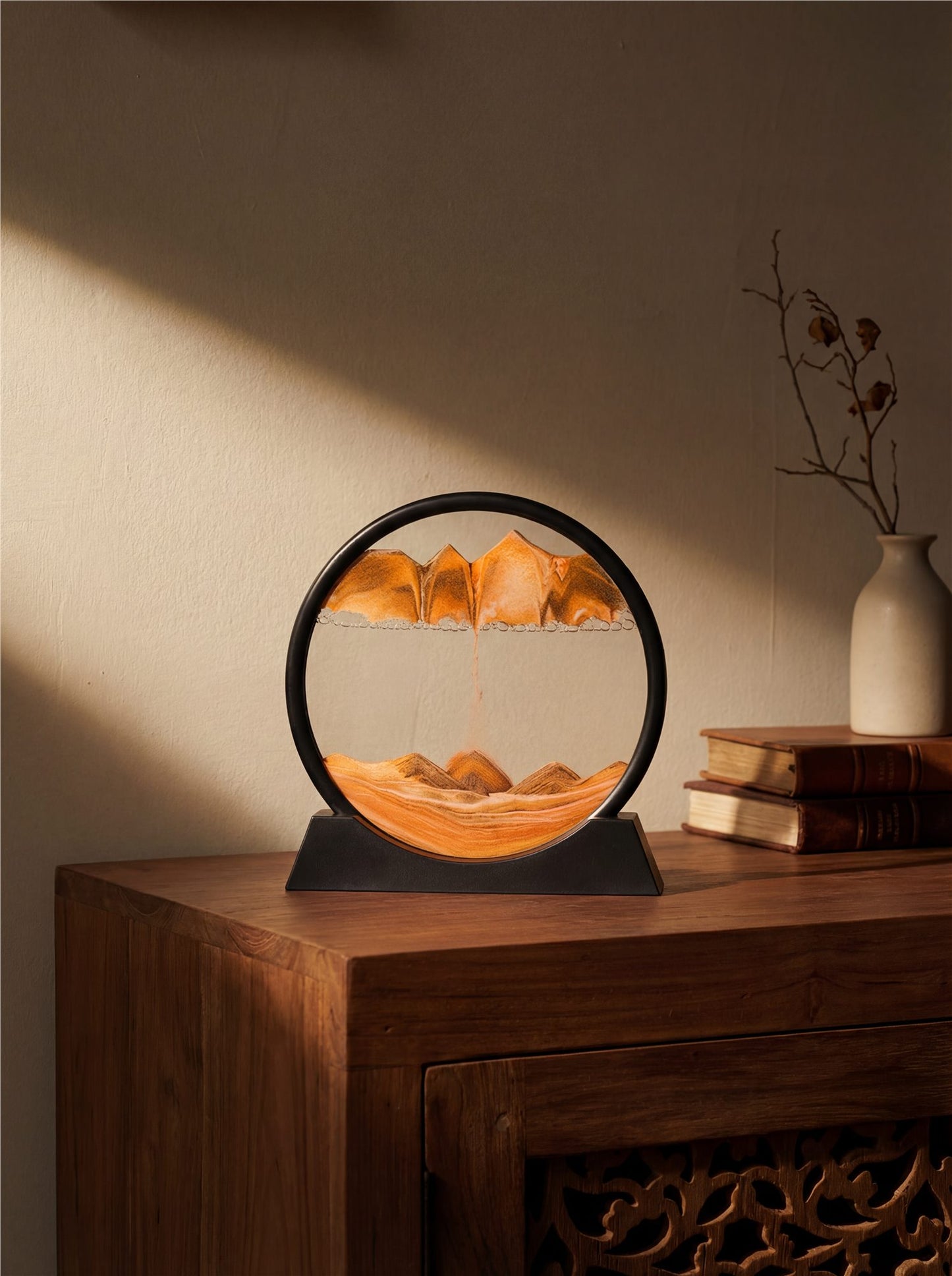Molten Sunset hourglass on bedside table