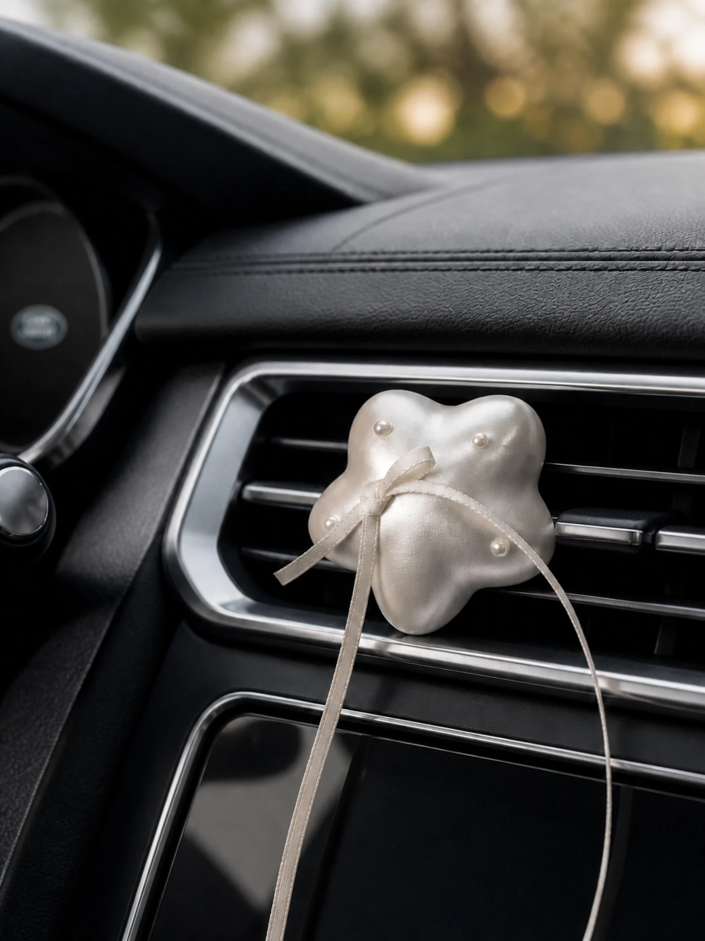 Pearl Wishes car vent ornament styled in an elegant vehicle interior