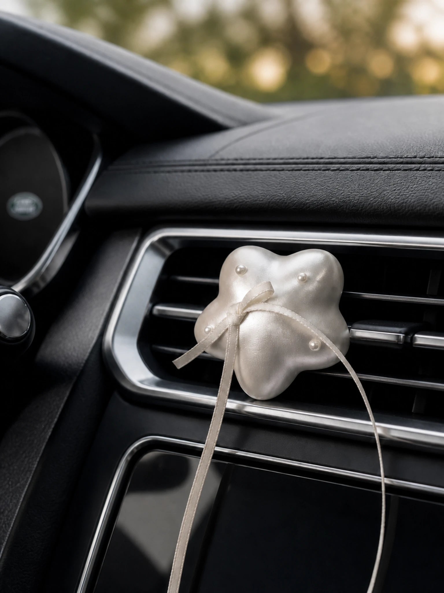 Pearl Wishes car vent ornament styled in an elegant vehicle interior