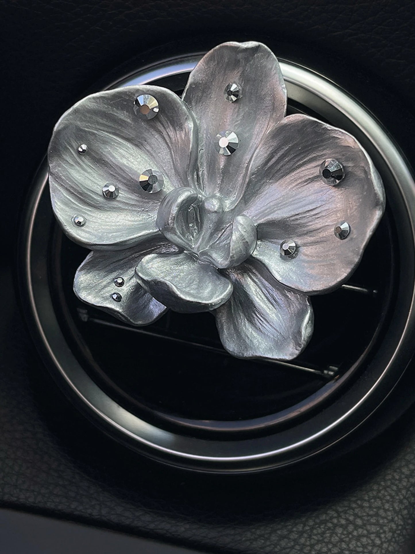 Close detail of the layered pearl silver orchid ornament