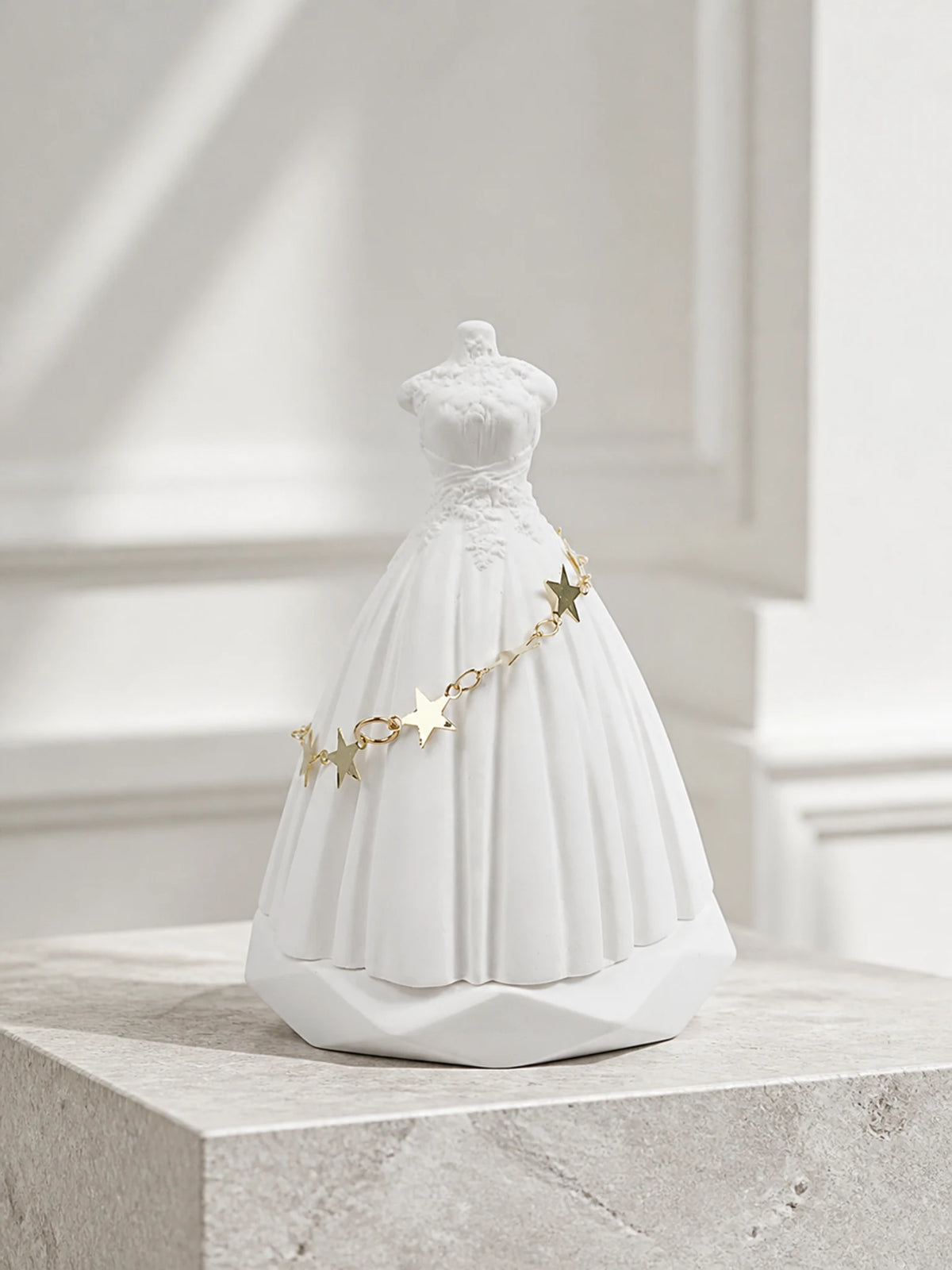 White bridal silhouette ornament with sculpted gown folds and gold star chain