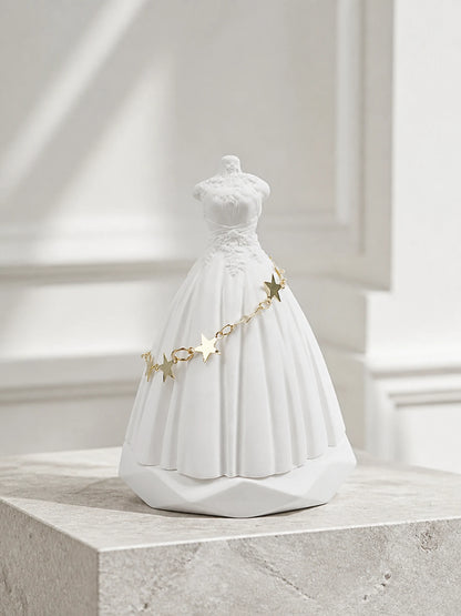 White bridal silhouette ornament with sculpted gown folds and gold star chain