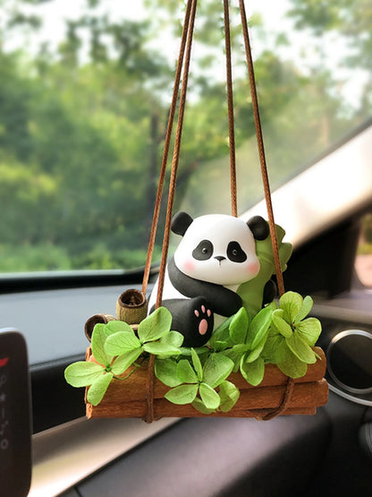 Bamboo Panda hanging charm shown at natural scale in a vehicle cabin