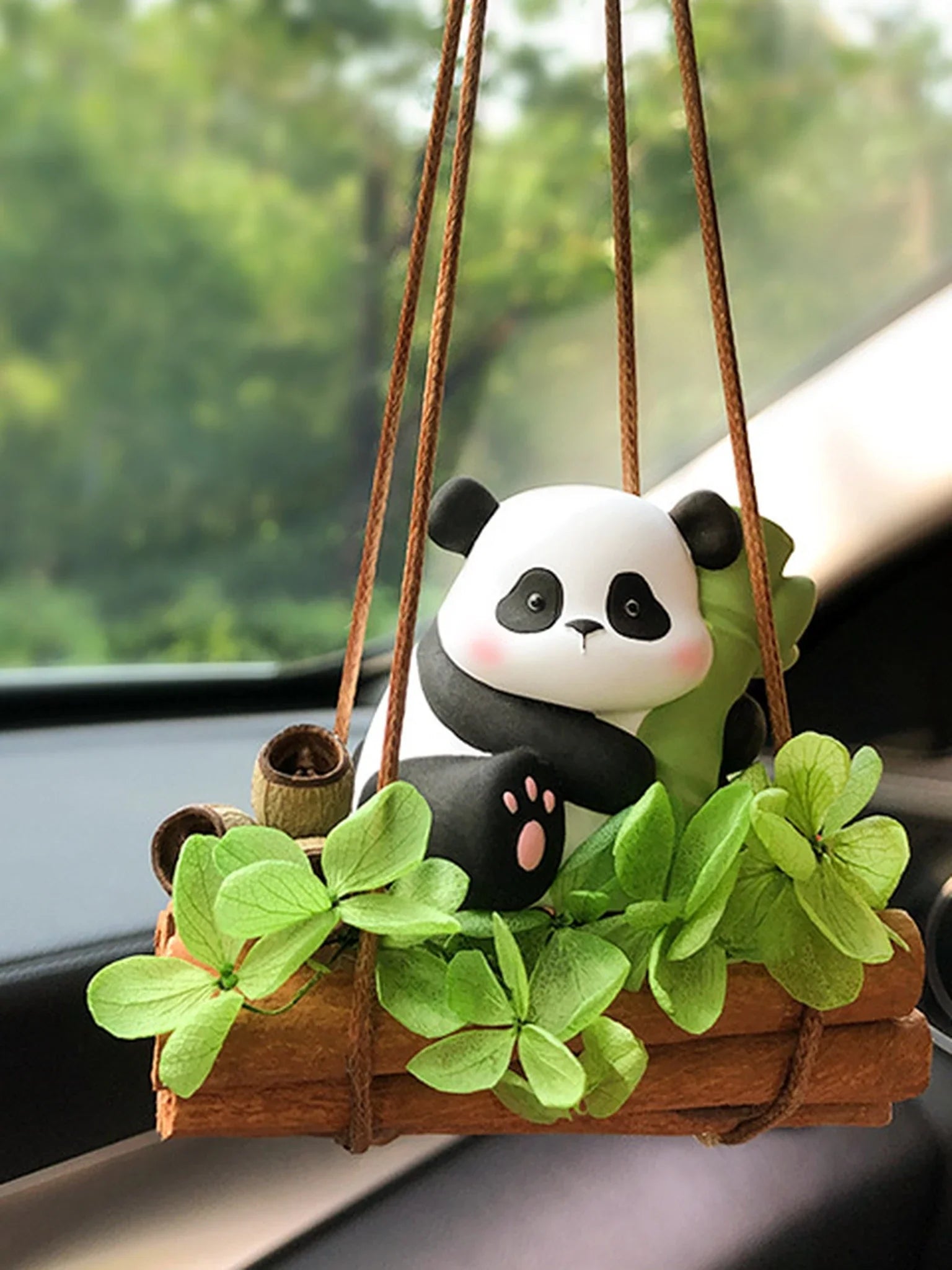 Natural-light close detail of the Bamboo Panda hanging car charm