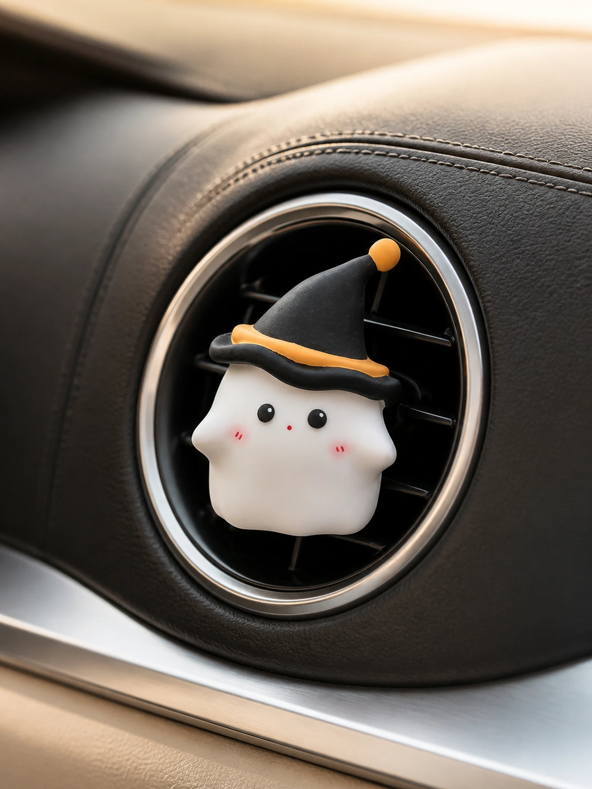 Midnight Ghost car vent ornament installed as the focal point in a premium cabin