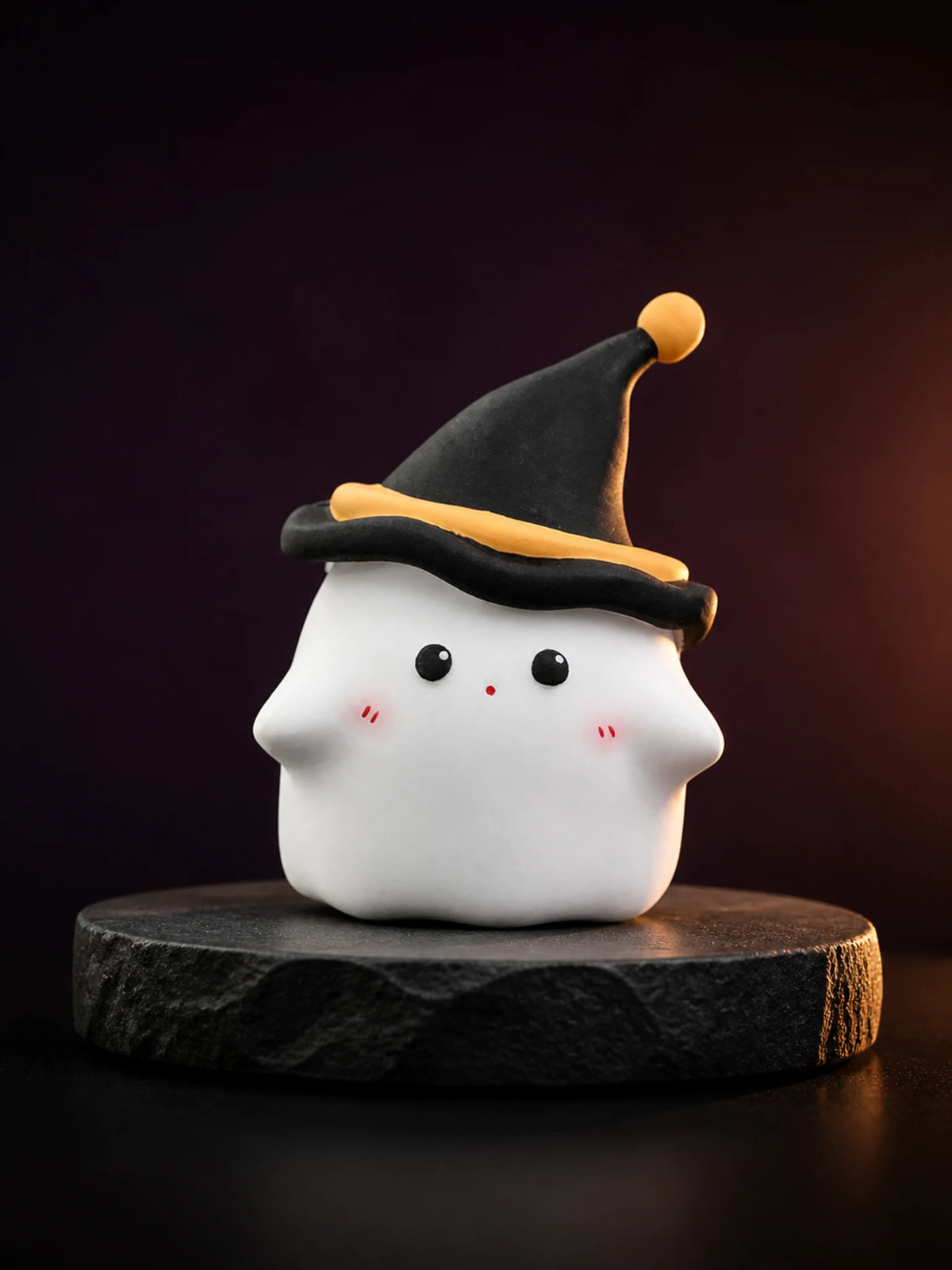 White Midnight Ghost ornament with black pointed hat and orange trim