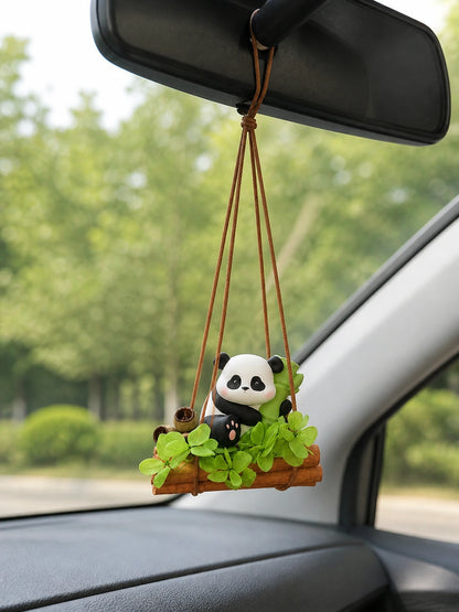 Bamboo Panda hanging charm shown at natural scale in a vehicle cabin