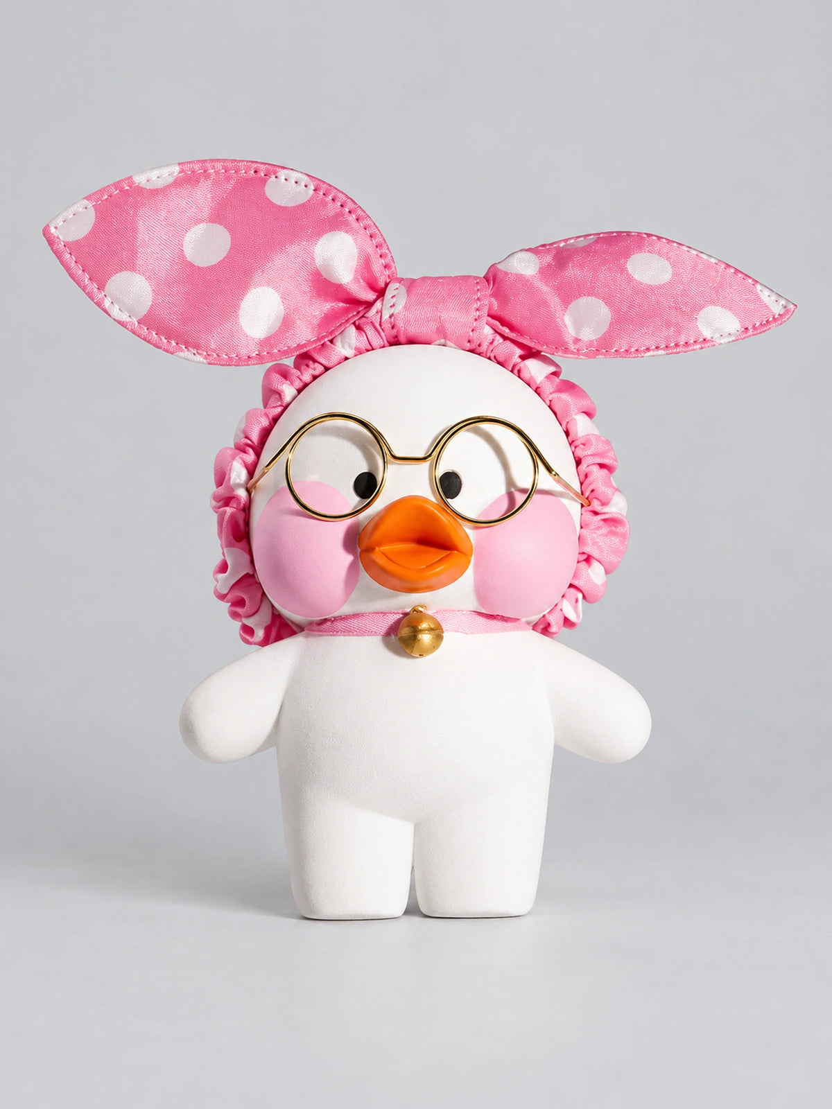 Pink Bunny Bow Duck with round gold glasses, pink polka-dot bow and gold bell