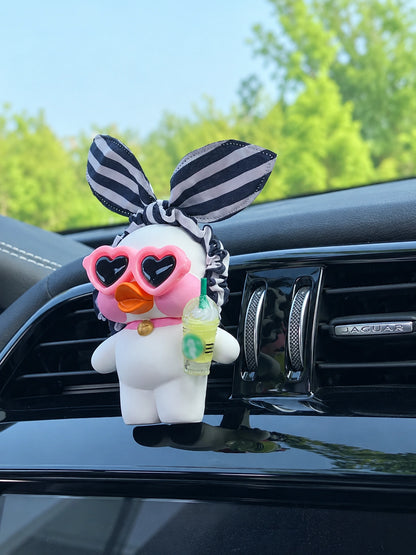 Black Stripe Bow Duck with heart-shaped sunglasses and decorative cup on the original car vent