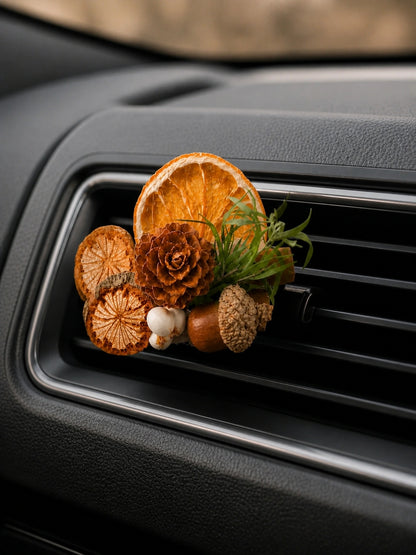 Citrus Grove car vent garden secured to a horizontal air vent