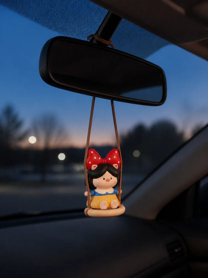 Side view of Pig Princess diffuser on car rearview mirror