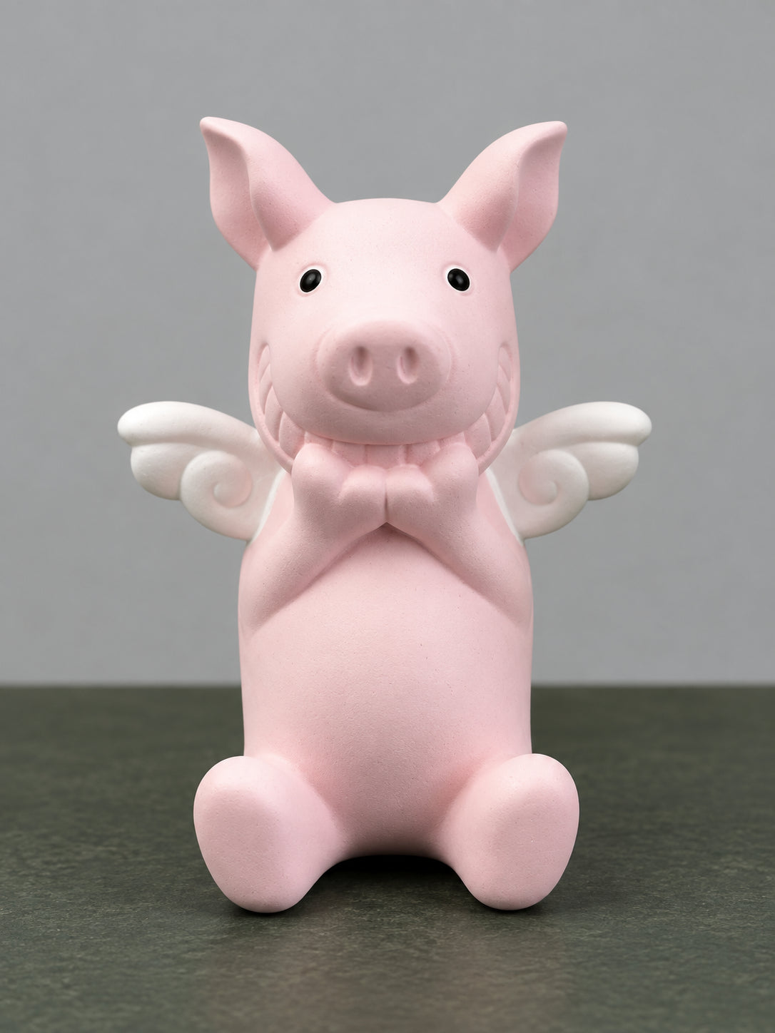 Complete front view of the pink Angel Wing Wish Pig with both white curled wings