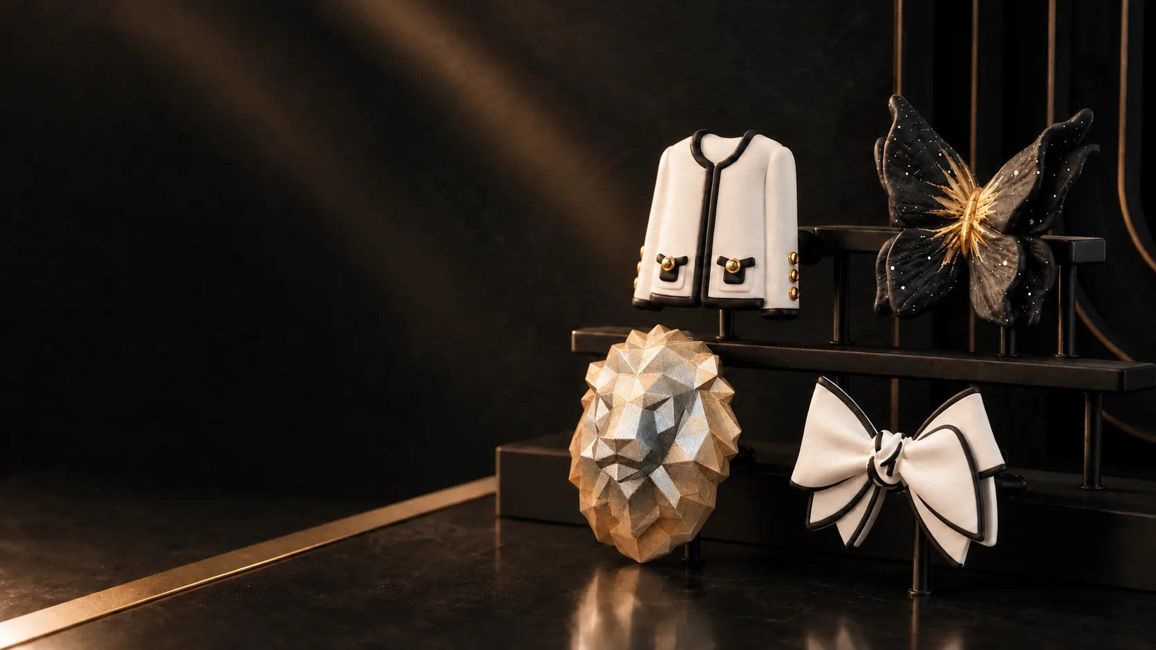 Black and gold editorial display of assorted scented decor objects.
